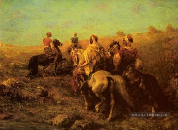 Cavaliers arabes arabes près d’un abreuvoir Arabe Adolf Schreyer Peinture à l'huile
